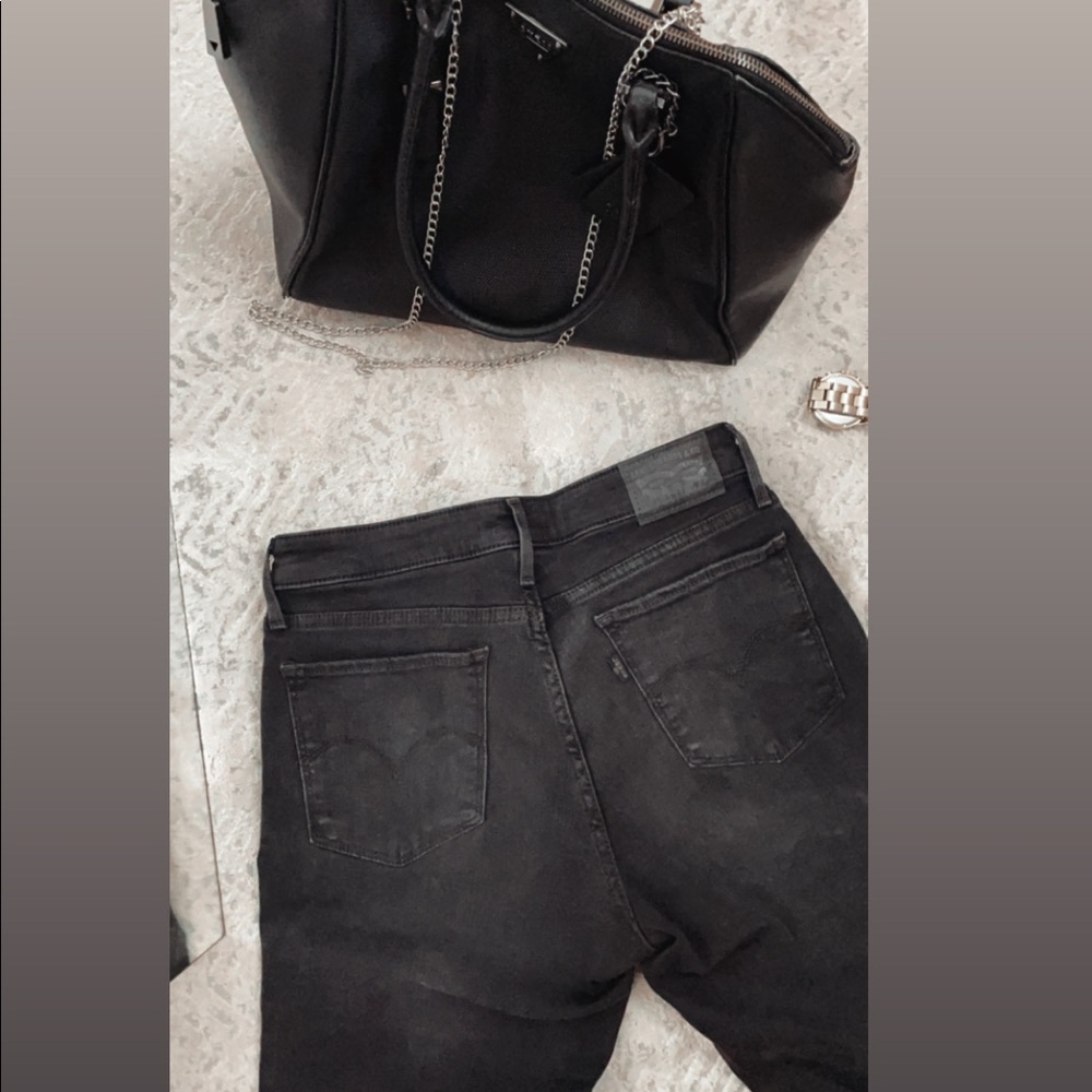 Levi’s black slim mid rise jeans